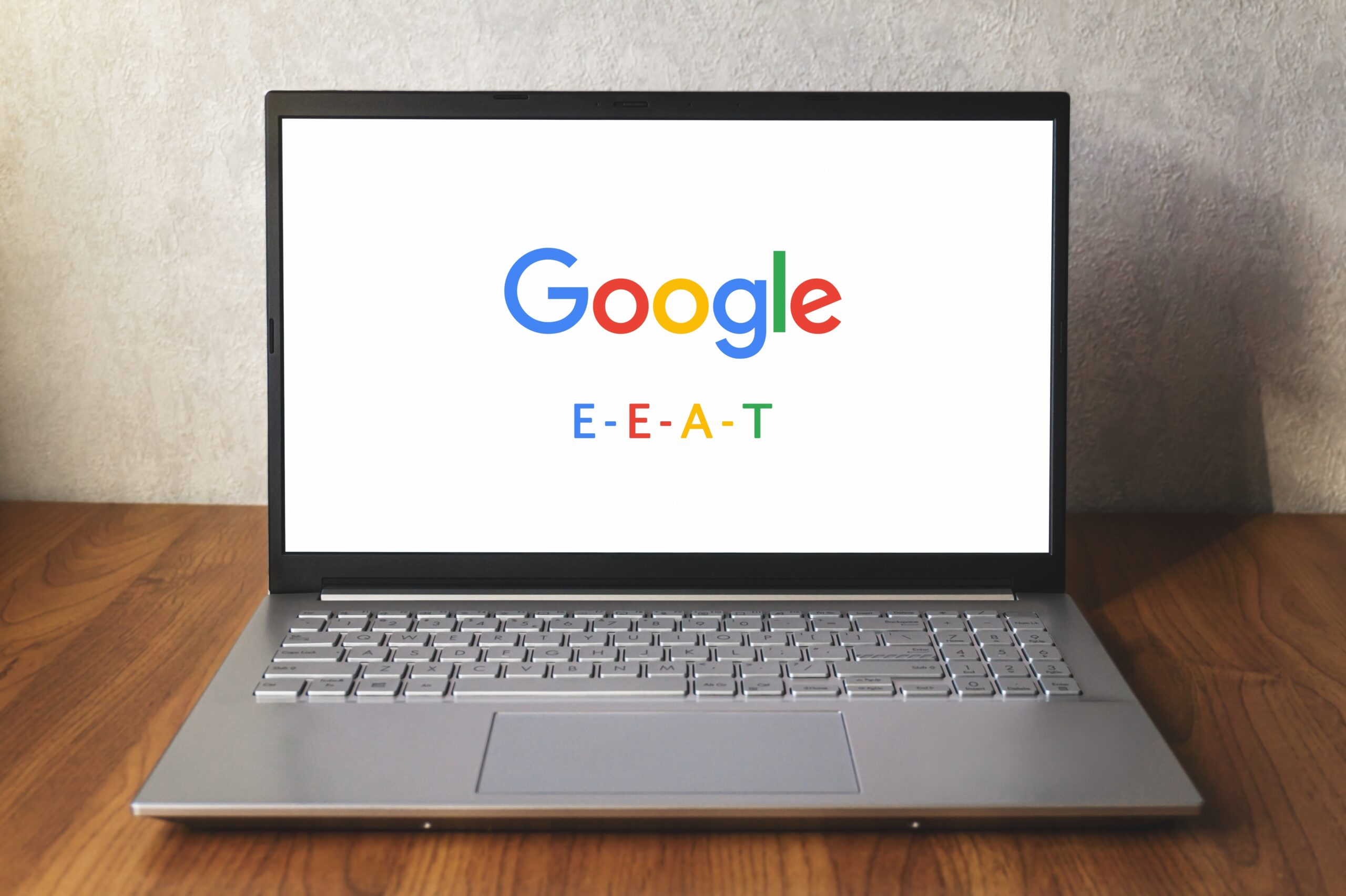 Laptop screen showing text that reads, "Google E-E-A-T"