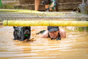 Jaime and Luigi crawling through water and under an obstacle 