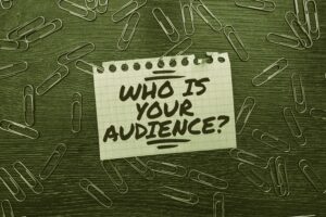 Yellow paper with black writing that says "Who is your audience?"